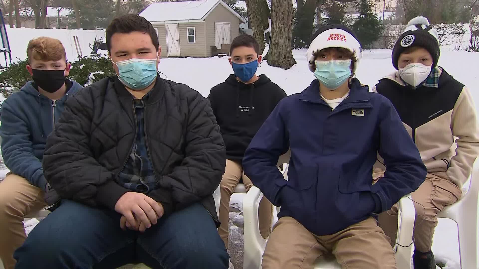 Five high school freshmen are being called heroes for saving two children from an icy pond